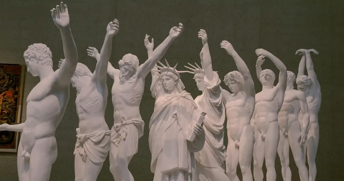 Image of old, greek statues dancing together in different, timeless poses.